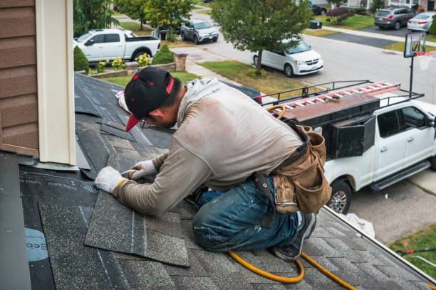 Professional Roofing technician working in Laketon, IN